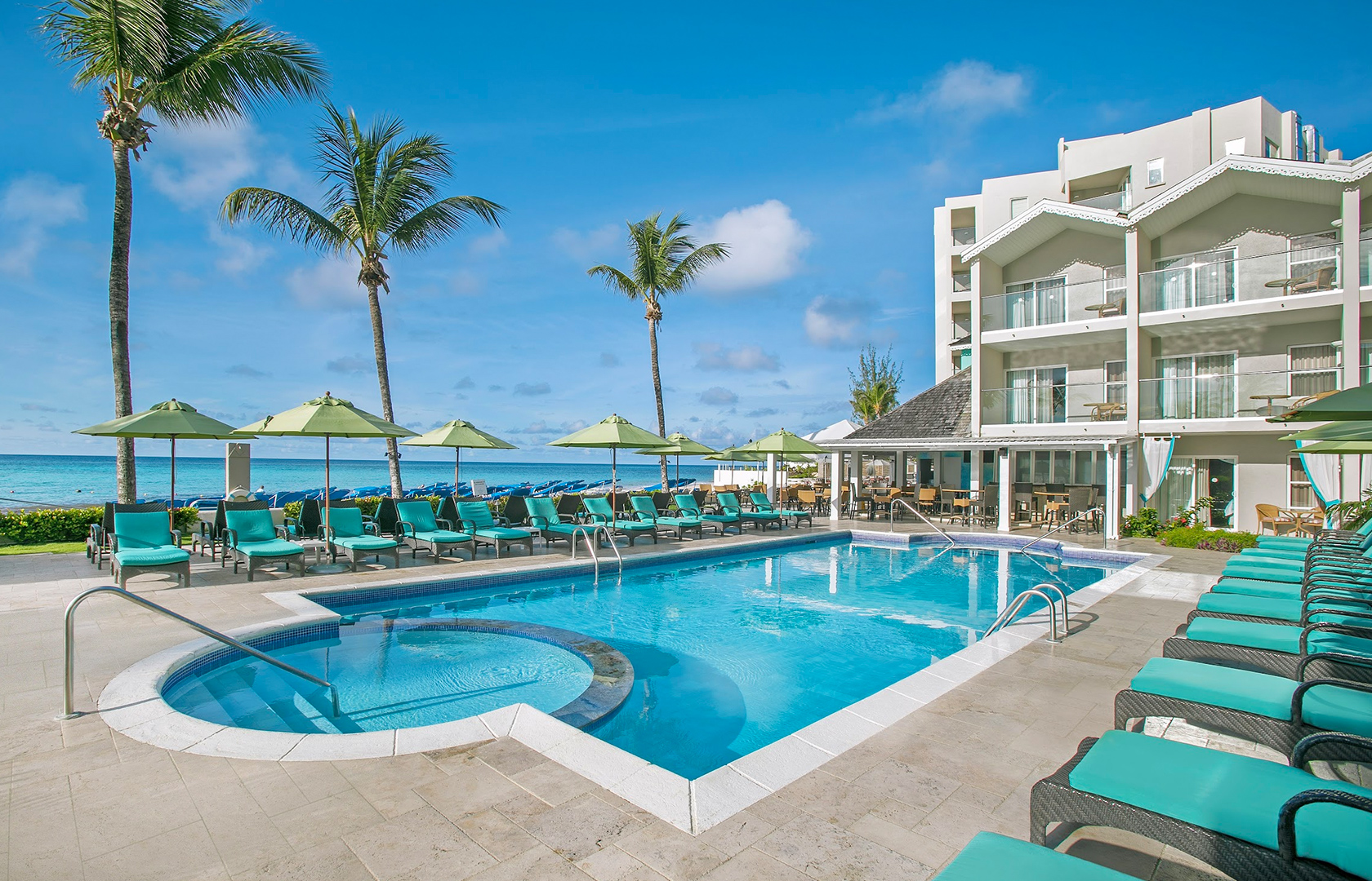 Sea Breeze Beach House pool overlooking the turquoise Caribbean Sea