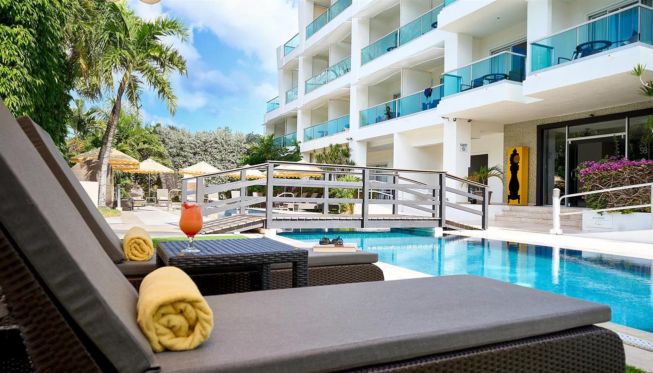 The pool and front entrance of The Rockley hotel in Barbados