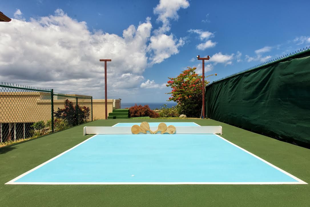 The pickleball court at La Maison Michelle with ocean views