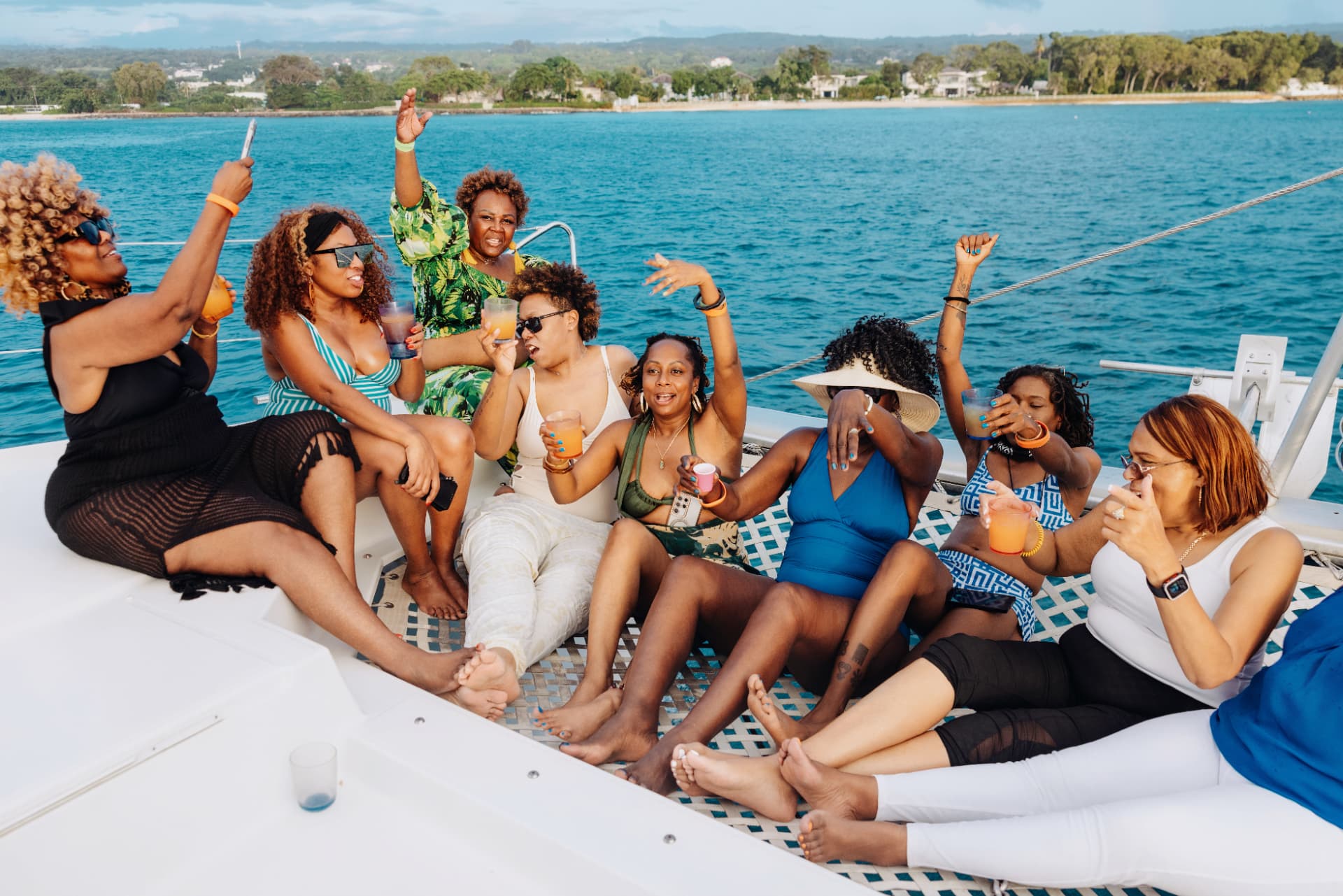 Travelers celebrating aboard a catamaran cruise in Barbados